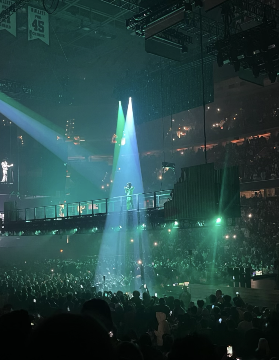 Tyler, the Creator singing “Take Your Mask Off” on the catwalk 